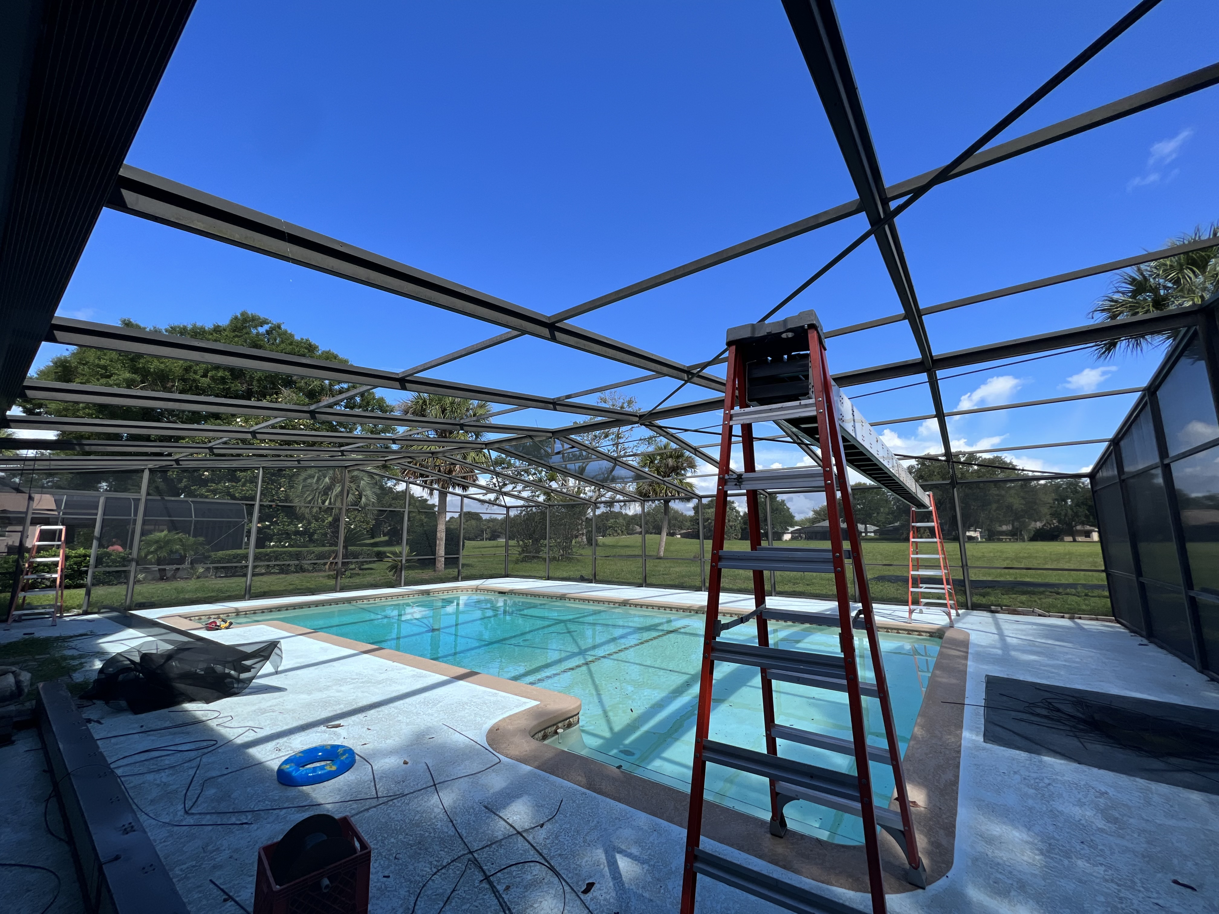 Pool cage frame being built